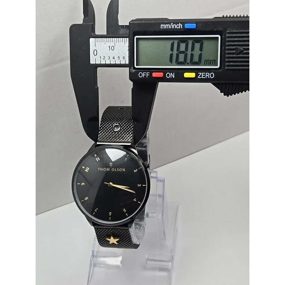 THOM OLSON watch little